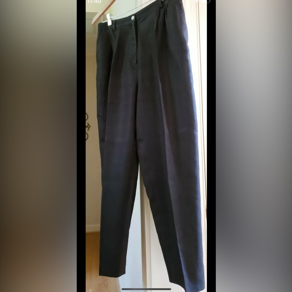 Pleated tapered rayon slacks.